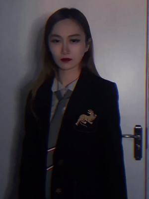 A post by @vevivegirl on TikTok caption: Do you like me to wear a sweater or a suit#tiktokpoll #overseasstudent #hongzhumcn #girls