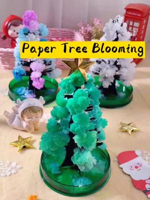 A post by @favor920 on TikTok caption: Magical paper trees bloom,have you ever played?#merrychristmas #gift