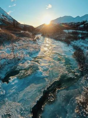 A post by @exploringalaska on TikTok caption: Drifting into the sunset 🔥🏔 Alaska #alaska