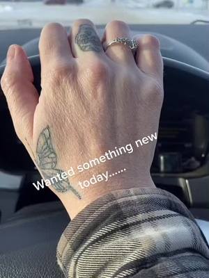 A post by @buck_family44 on TikTok caption: #tattoolover #handtattoo #fyp #earlybirthdaygift #mykidsnames #rose