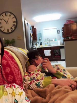 A post by @dayfamilyx on TikTok caption: grinch pjs 😂😂 dawson and gunner are NOT happy 😭😭💚🤣