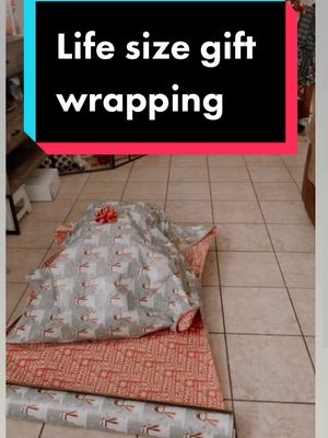 A post by @realtor.nursehelen on TikTok caption: #helping mom #wrap dads last minute #gift#merrychristmas🎄 #christmashumor🤪 #giftwrappingideas #giftideasforhim #giftideaforher #reality #Fyp #1