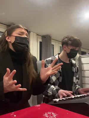 A post by @jenny.brq on TikTok caption: petite vidéo avec mon frère à Noel ❤️ vous avez fêté Noel ? 🎄 #pourtoi #chant #frere #piano