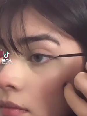 A post by @jun1361 on TikTok caption: Will you try this eyeliner look?#fyp