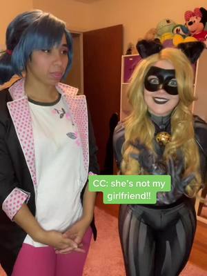 A post by @kayotic_queen on TikTok caption: I am not a girl?! | Chat Noir- @katie_kat_yo | #miraculouscosplay #marinettecosplay #chatnoircosplay #marichat