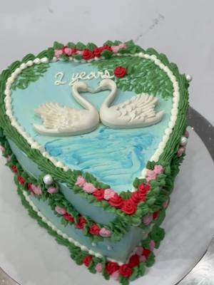 A post by @juliesnegur on TikTok caption: put your white tennis shoes on, and follow me #vintagecake #cakedecorating #ldr #lanadelrey #swansong