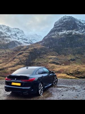 A post by @v6reg on TikTok caption: Sunday drive  #Glencoe #bmw #msport  #drives #scenery #mountainsview #backdrops #235i #black #cars #fyp