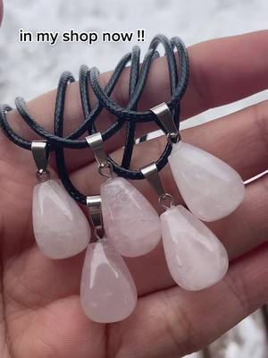 A post by @celebi.crystals on TikTok caption: my hands are freezing but i love these so much !!! #fyp #zxycba #crystals #SmallBusiness #smb #crystaljewelry #crystalnecklace #rosequartz