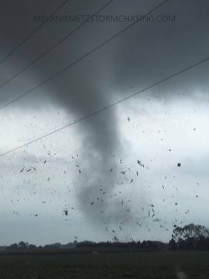 A post by @melaniemetzstormchasing on TikTok caption: A little close for comfort! #Tornado in #IL on 8/9/21. https://www.youtube.com/c/MelanieMetzStormChasing