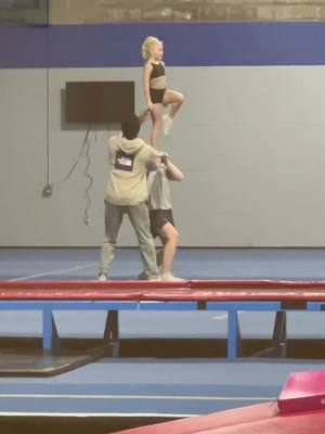 A post by @tcarlsrud on TikTok caption: When you find a coach that celebrates each achievement, you will soar! @ladarius_marshall17 #cheerathletics #cheerathleticspensacola #stunting #cheer