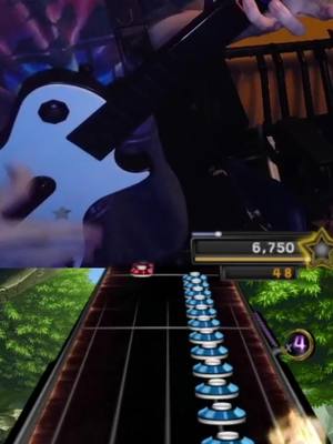 A post by @captnmarioyt on TikTok caption: Rake strumming is fun :D Don't mind CarnyJared's stream in the background #clonehero #cloneherotiktoker #fyp