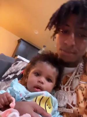 A post by @officialnba_yb on TikTok caption: Babygirl💚 #daddysgirl  #fyp #imback #myprincess #nbayoungboy