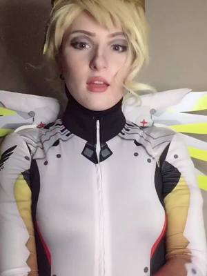 A post by @tigerfestival on TikTok caption: #tigermercy#overwatchcosplay#mercycosplay#overwatch#overwatchmercy