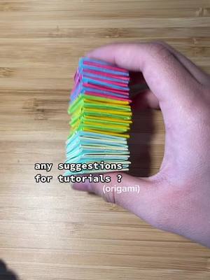 A post by @.0rigam1 on TikTok caption: pls comment!! #suggest #origami #tutorial #fyp #viral #xyzcba #paper