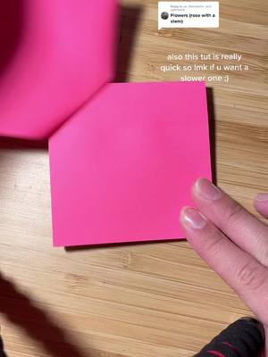 A post by @.0rigam1 on TikTok caption: Reply to @xo_thaneesha_xo  #flower #rose #tut #tutorial #paper #origami #viral #fourup #postitnote #green #pink