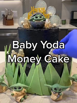 A post by @heyitzveee on TikTok caption: 🤯Crazy Money Pull Yoda Cake! 😱#yoda #cake #money #starwars @Disney+