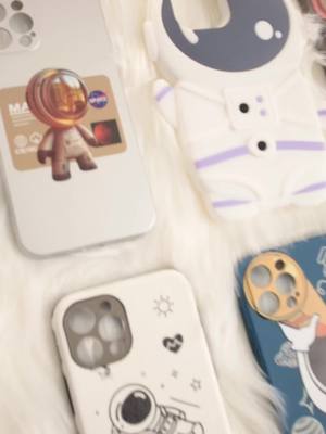 A post by @couplephonecase on TikTok caption: Which astronaut case do you like?? #phonecase #phonecover #phoneprotector #space #astronaut #foryou #fyp