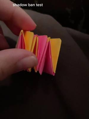 A post by @.0rigam1 on TikTok caption: low-key forgot about this account😭 anyways i have school tmr #fyp #shadowbantest #origami #postitnotes