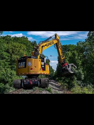 A post by @alanstack on TikTok caption: Trimming Trees along the railroad in the eastern United States.                    #helicopter #viral #aerialsaw #bluecollar #bluecollarboys #redneck