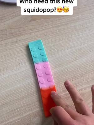 A post by @lkcj.uk.fidgets on TikTok caption: So satisfying😍Get this in tiktok shop or bio l1nk 😊#fidgets #fidgettoys #toys #squidopop