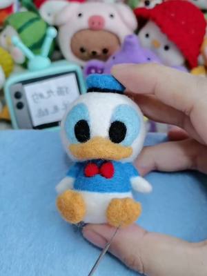 A post by @art_yang on TikTok caption: anyone who likes Donald Duck?please hands up😝#mickeymouse #donaldduck #disney #doll #fypシ #handmade #satisifying