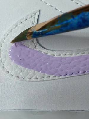 A post by @customcrepcityuk on TikTok caption: Lilac and white AJ1 process. Volume up or headphones on!😉#linkinbio #fyp #nike #jordans #fashion #teach #lilac #white #cccuk #process #sneaker