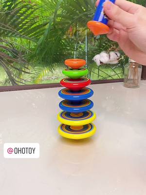 A post by @ohotoy.us.yaokong on TikTok caption: And son play of folding gyro challenge, too stimulating, folding eight of them and you can fold a few layers?#usa #funtoys #toys