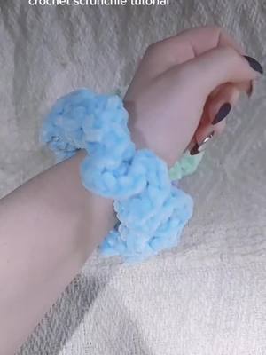 A post by @crochetcuties on TikTok caption: slightly beginner friendly tutorial. I purchased this yarn and the hooks from my local dollar tree! #crochettutorial #crochet #DIY #craft #yarn #crocheting