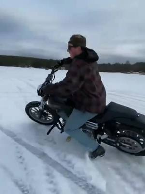 A post by @outlawharleydavidson on TikTok caption: Studded tires on the Dyna make for a fun snow day! 😎❄️                                        🎥: @mikepaysonn #SmoothLikeNitroPepsi #harleydavidson