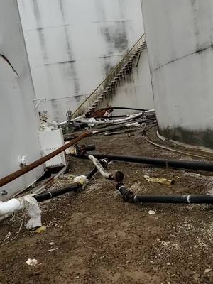 A post by @craig.lively88 on TikTok caption: If anyone was wondering what a 640,000 gallon liquid tank looked like when it's burst here you go. #liquidfertilizer #agriculture #fertilizer #fuckedup #work