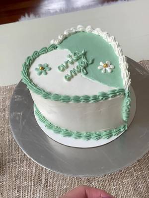 A post by @juliesnegur on TikTok caption: chaotic bday cake decorating + an extra cake just for me #cakedecorating