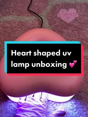 A post by @vanityvalencia on TikTok caption: New nail room find 💅🏽🥰 #nails #uvlamp #kawaii #nailroom #nailroomfinds #fyp #pink #heartshape #unboxing