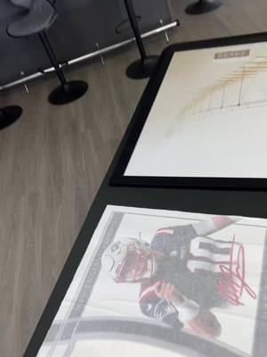 A post by @fearless_sportscards on TikTok caption: Mac Jones Jersey Framing Reveal! #fyp #nfl #lcs #sportscardsinvesting #macjones #jersey #sportscards