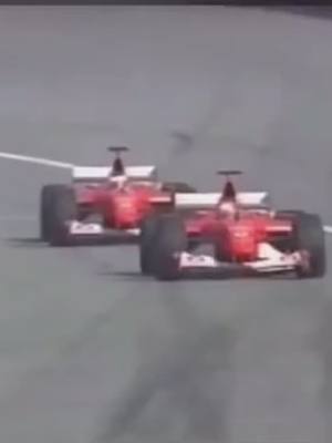 A post by @cars.with.ollie on TikTok caption: 2002 USA GP #fomula1 #schumacher #usa #f1racing #cars #fyp #f1 #viral