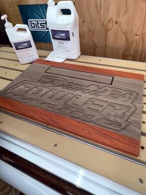 A post by @walkerswoodworks on TikTok caption: Filling in this custom in car laptop tray with @totalboat  high performance 2:1 epoxy 👍👍 #totalboat #walkerswoodworks #laptoptray