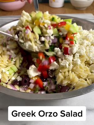 A post by @craving_california on TikTok caption: Greek Orzo Salad with Feta & Olives! | #EasyRecipes #healthyfood #orzosalad