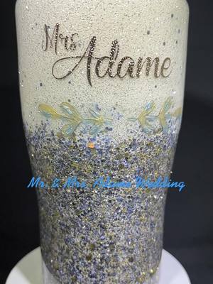 A post by @daisy_hey_da_designs on TikTok caption: Made for Mr. & Mrs. Adame wedding. Using glitter from @Glitter Heart Co. powder blue mixed with gold and stardust. #tumblersoftiktok #tumblermaker #tumbler #wedding #fypage #SmallBusiness #smallbusinessowner #womenownedbusiness #MoveWithTommy #DIY