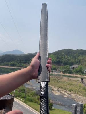 A post by @liuliusword8 on TikTok caption: I’m a craftsman, give it a name thank you 🙏 #sword #fyp #cool #outdoor #amazing #anime #craftsman