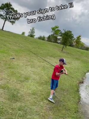 A post by @ on TikTok caption: Teaching him to use a baitcaster tested my patience for hours #lilbro#fish#teach#fishing#fyp#ciral#famous#pond#lake#katy#bridgeland#taxas#texasfishing#chasebaitsusa#river#stream#creek#laremouthbass#Summer#spring#Outdoors