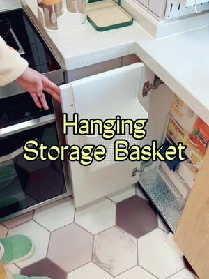 A post by @deltanb on TikTok caption: Durable Bathroom Over Cabinet Door Hanging Storage Basket Holder Organizer Support Kitchen Tools Storage Shelves wall shelf#tiktokmademebuyit #amazonmusthaves #smarthome #foryou