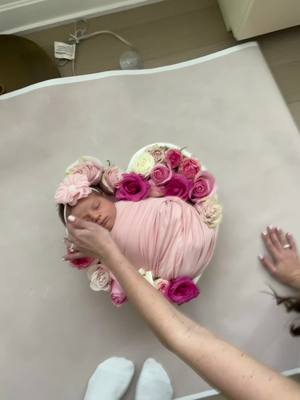 A post by @photographybyasiya on TikTok caption: #NewbornPhotoShoot #NewJerseyNewborn #NewJerseyMom #NewJersey #NYC #NYCMom #PhotoShoot #NJPhotographer #NYCPhotographer #newbornphotographer #FreshFlowers #Roses #NewbornFlowers  #fyp #viral