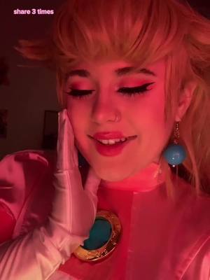 A post by @rooroo_cos on TikTok caption: uh oh?? peaches is back?? 💖🍑 #FindYourEdge #princesspeach #princesspeachcosplay #mario #nintendo #nintendocosplay