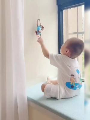 A post by @sproutfox_home on TikTok caption: Monkey climbing tree kids toy 🤭    #kidstoys #babytoy #toy #monkey #fyp