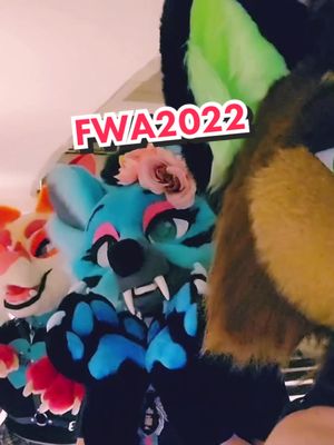 A post by @the_grinsome on TikTok caption: Mini con vid from FWA2022! @monstermalamute @harleyhyaena @furbakery #fwa2022 #furry #furryfandom #furrytiktok