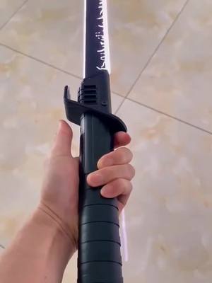 A post by @anime_swords_ on TikTok caption: Anyone want it❓#katana #lightsaber #anime