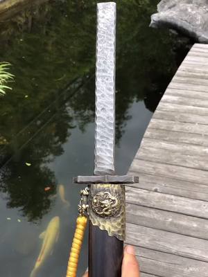 A post by @dongzhu091 on TikTok caption: #handmade #katana #sword #tiktok