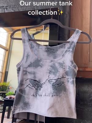 A post by @_gabriellarae_ on TikTok caption: Which tank are you wearing this summer? Shop now at GabriellaRae.com💕 #totebag #screenprinting #smallbusiness💕 #screenprintedclothing #y2kmoment #womenownedbusiness🦋 #y2koutfitidea #y2kmoment