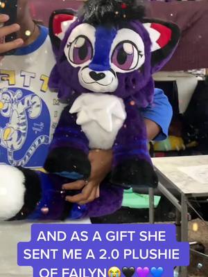 A post by @blackcheetah905 on TikTok caption: MY FRIEND @happy_the_fox WHO MADE MY 1.0 PLUSHIES HAS SENT ME A 2.0 AS A GIFT AND IBROKE DOWN IN TEARS😭😭🖤💙💜 THANK YOU SO MUCH HAPPY I LOVE YOU. GO SHOW HER SOME LOVE NOW💕💕 #furry #foryoupage #plushies #viral #thisiswhatigot #friendship #fyp #featureme