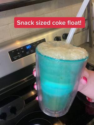 A post by @bye.bye.diets on TikTok caption: Perfect portioned coke float for a snack! #snack #lowcalorie #snacksideas #summersnacks #icecream #coke