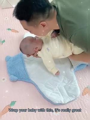 A post by @parenting_knowledge on TikTok caption: Wrap your baby with this, it's really great#parentingknowledge #child ##parenting #parenting #toddler #baby